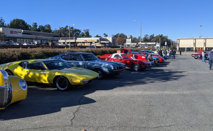 Classic cars lined up at Heights Cruizers Cars & Coffee