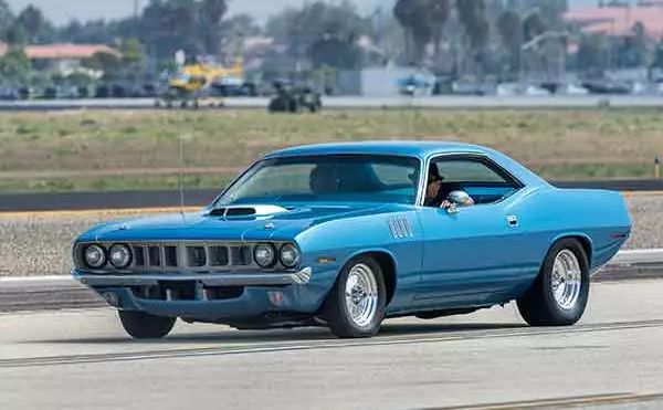 Wings Over Camarillo Car Show – classic blue muscle car cruising along the tarmac