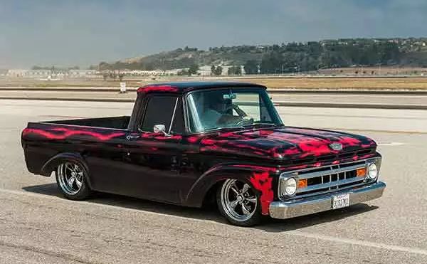 Wings Over Camarillo Car Show – lowered classic pickup with custom flame paint job
